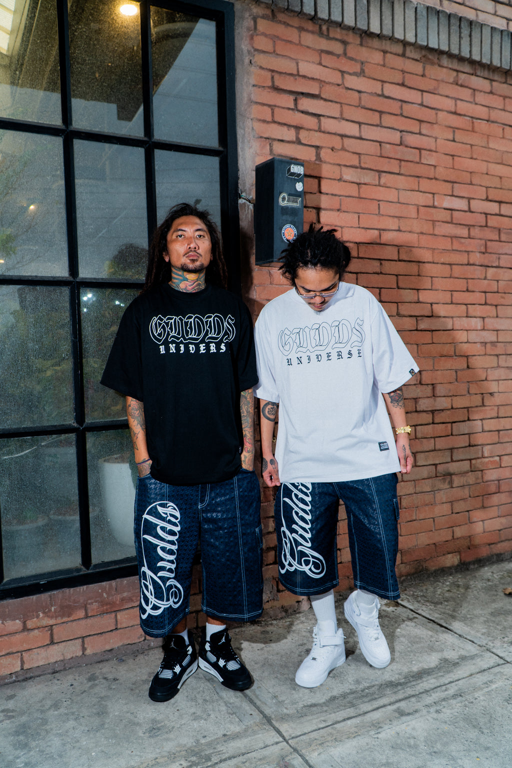 GUDDS UNIVERSE - "NEVA FOLD" BIG BACK PRINT TEE!