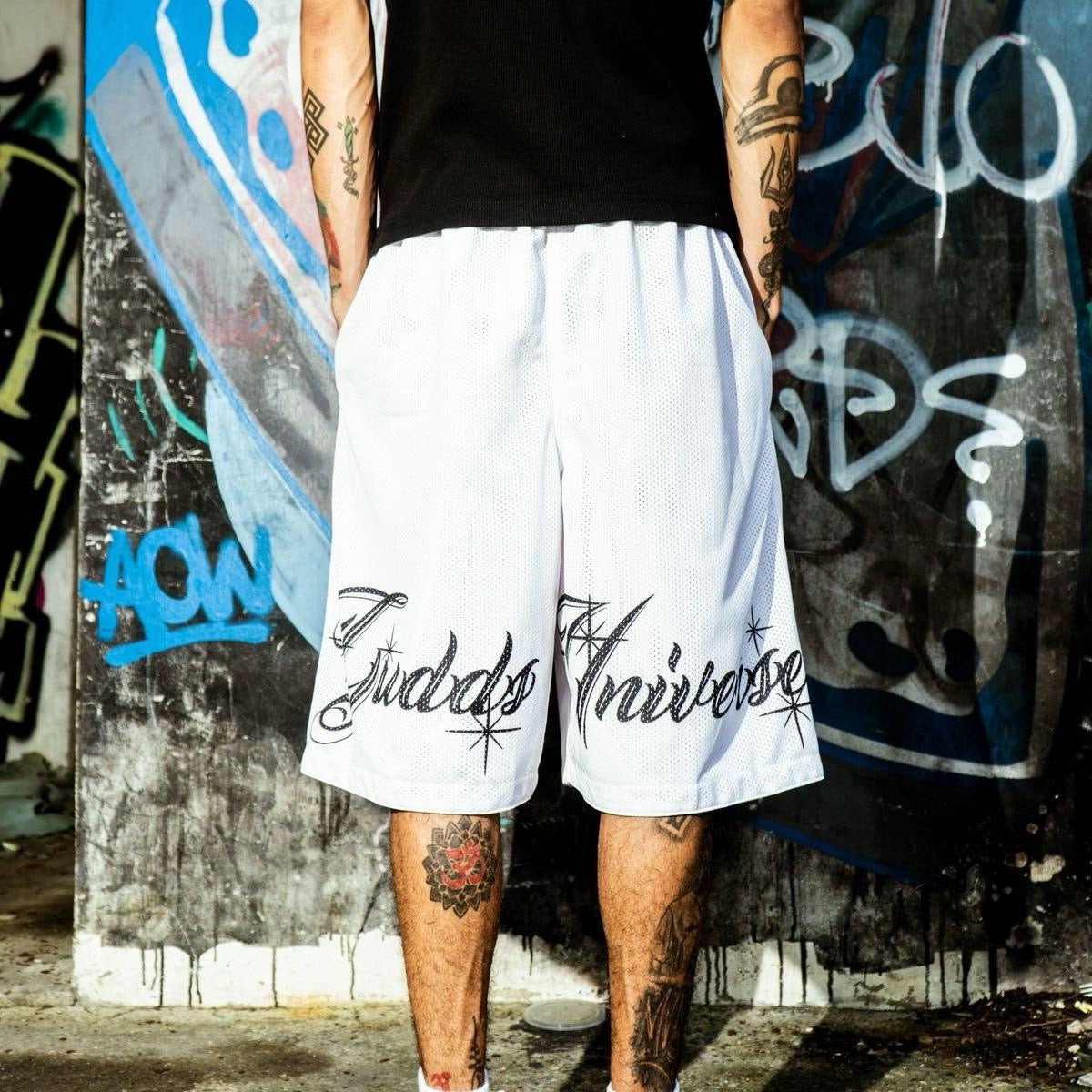 “CHICANO SCRIPT" MESH SHORTS