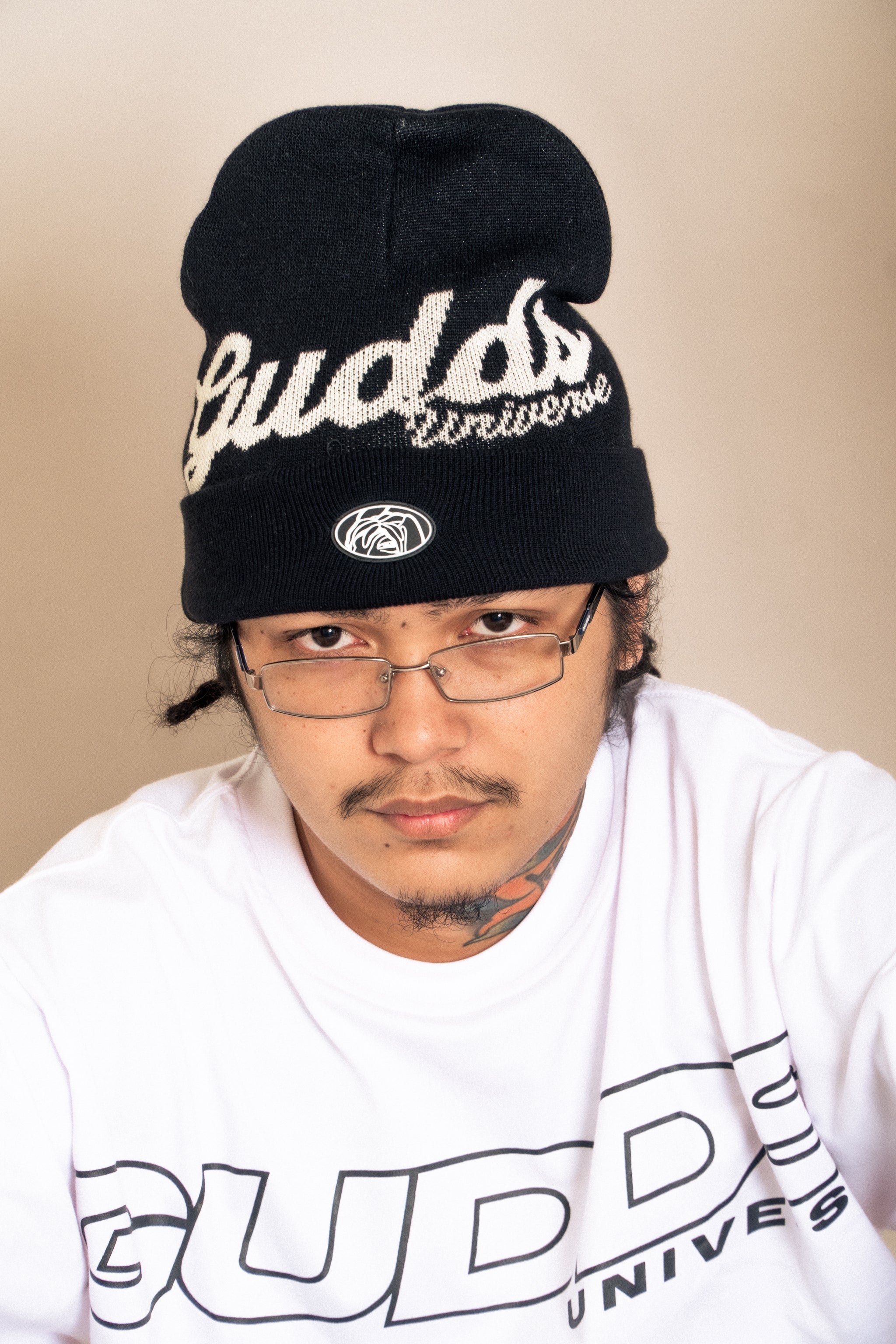 “CURSIVE” BEANIE WITH OVAL LOGO RUBBER PATCH