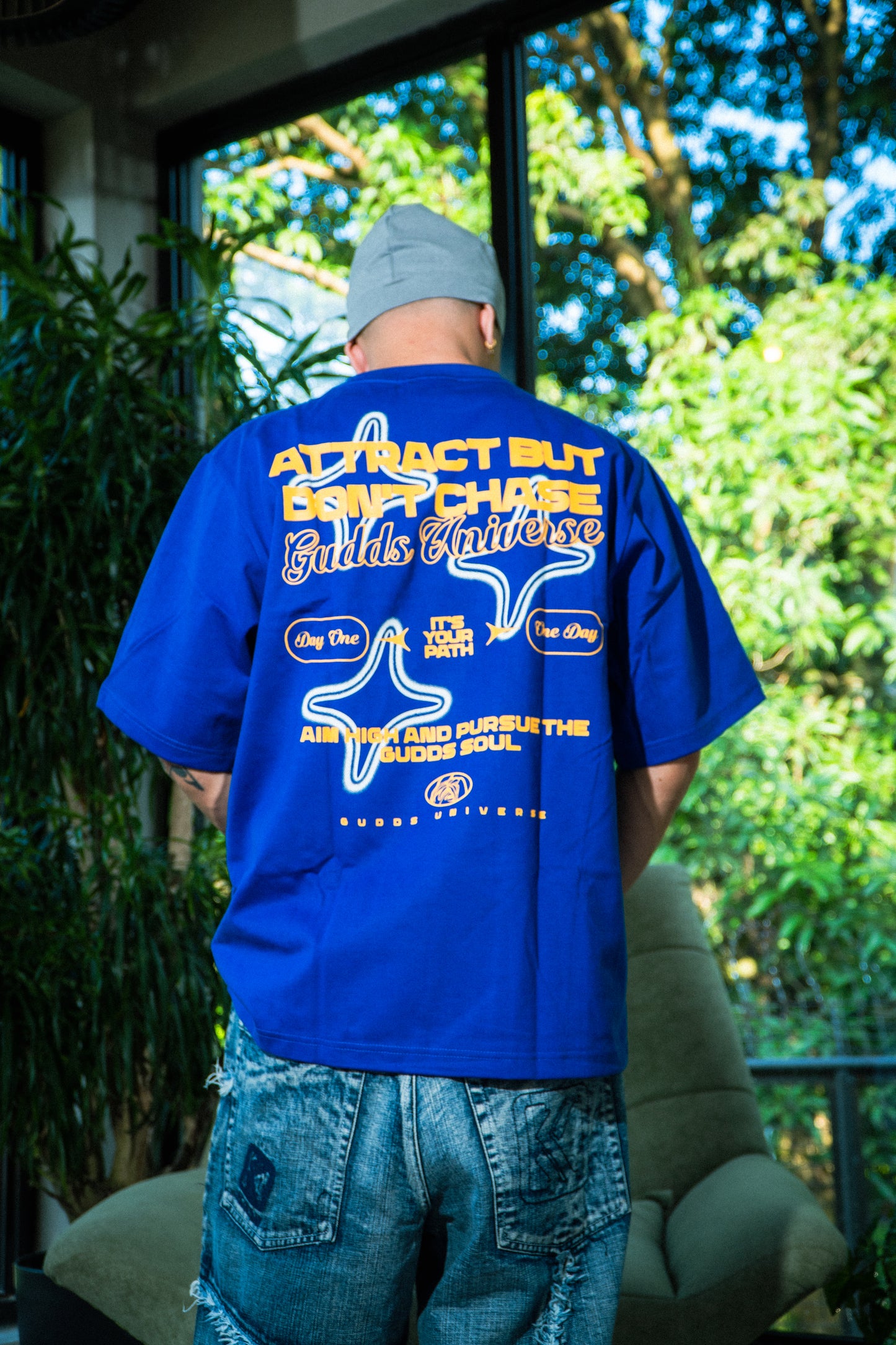 GUDDS UNIVERSE - “ATTRACT” GRAPHIC TEE
