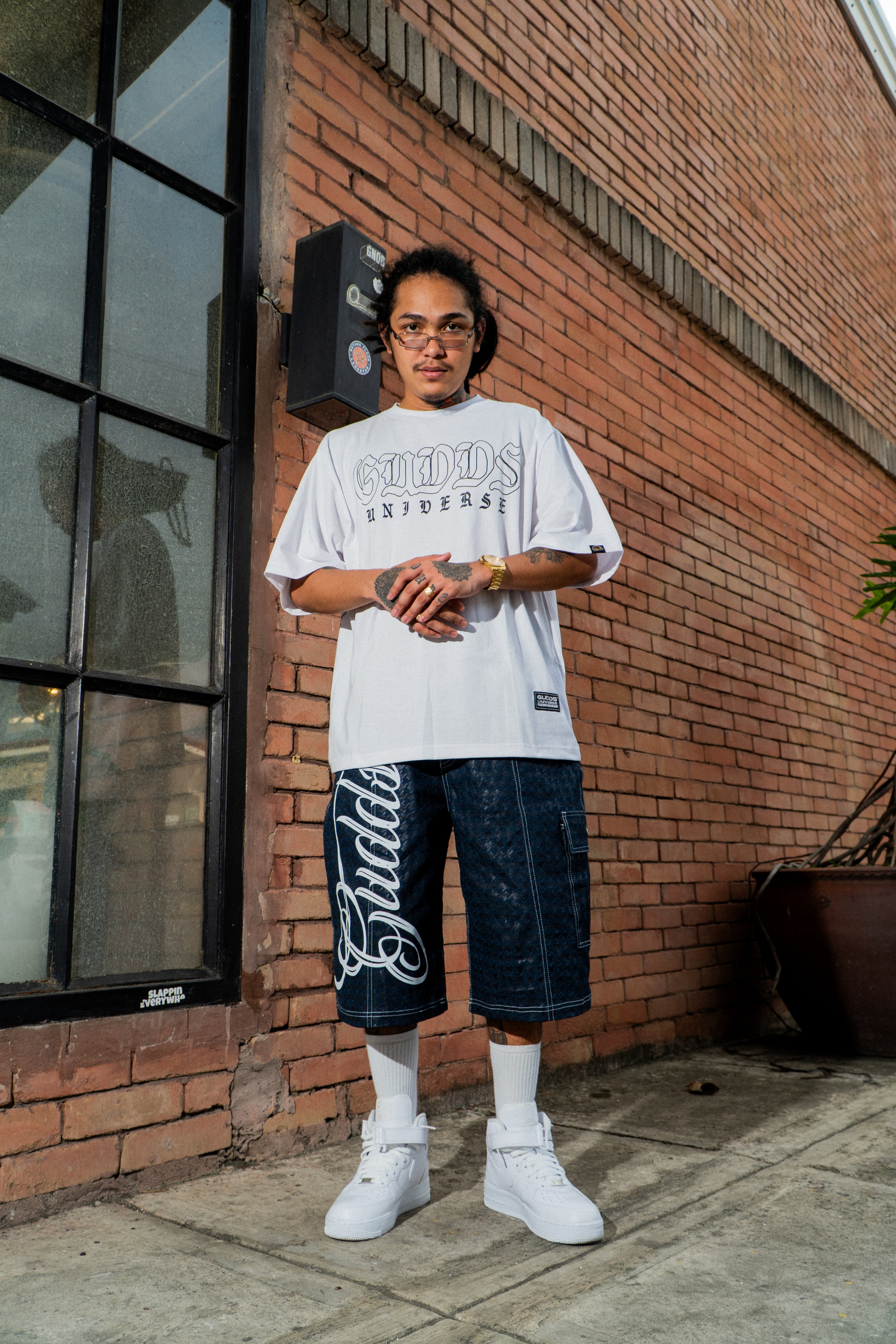 GUDDS UNIVERSE - "NEVA FOLD" BIG BACK PRINT TEE!