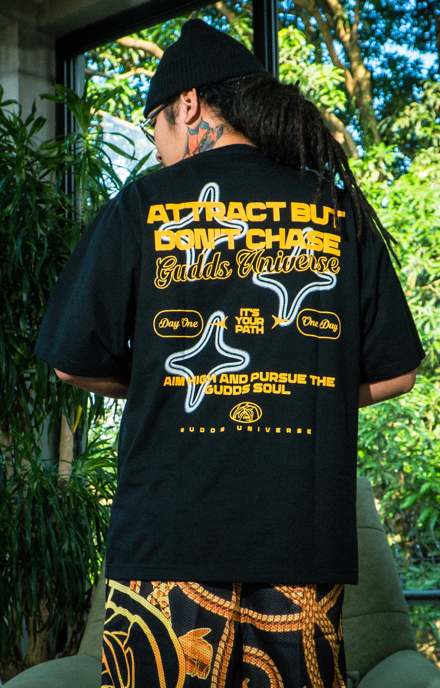GUDDS UNIVERSE - “ATTRACT” GRAPHIC TEE