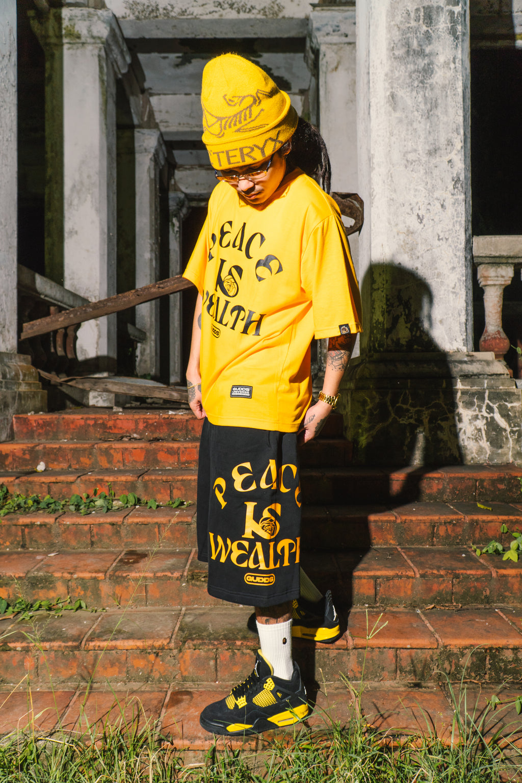 “PEACE IS WEALTH” SWEATSHORT