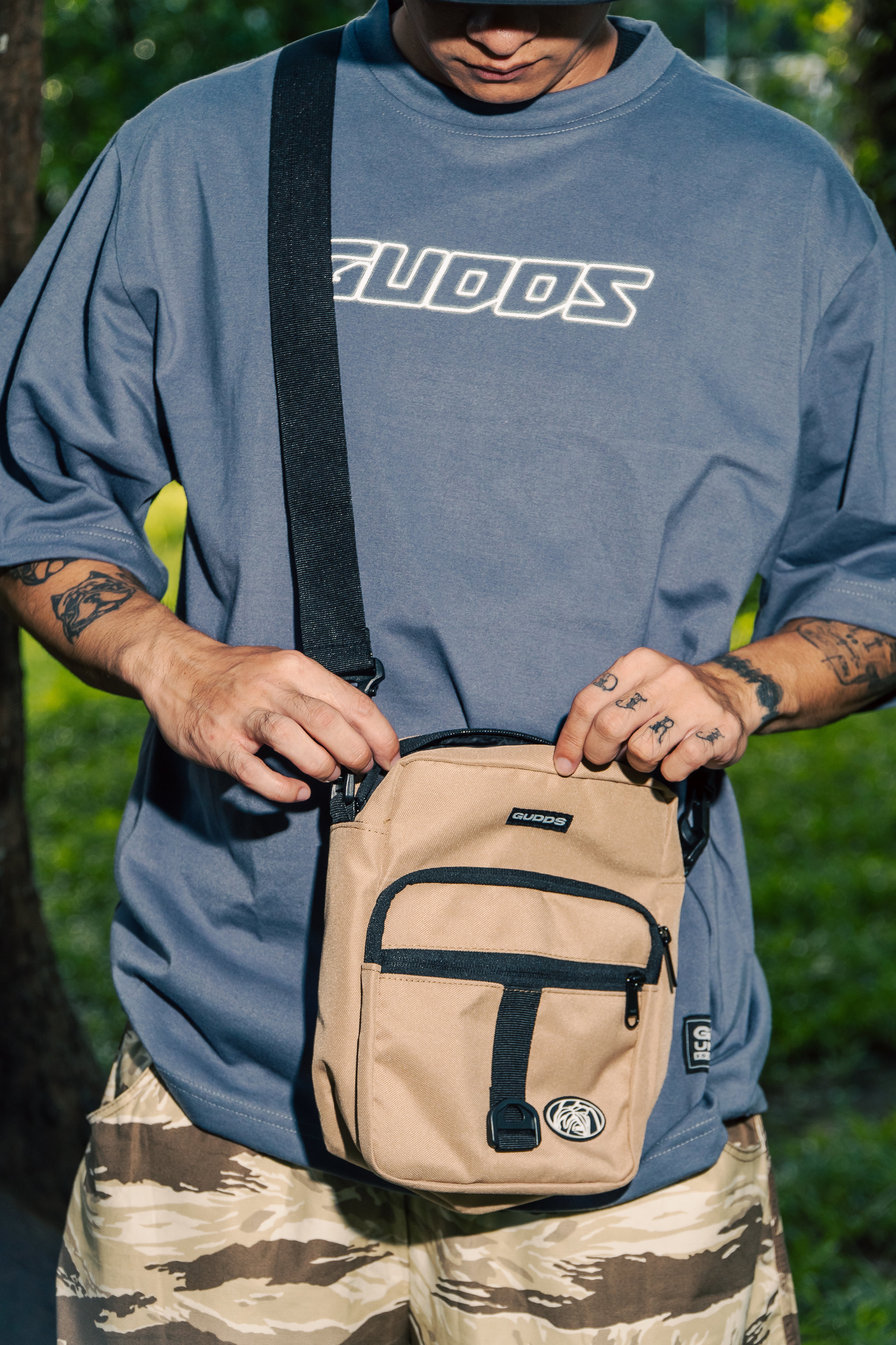 “MULTI POCKET” SLING BAG