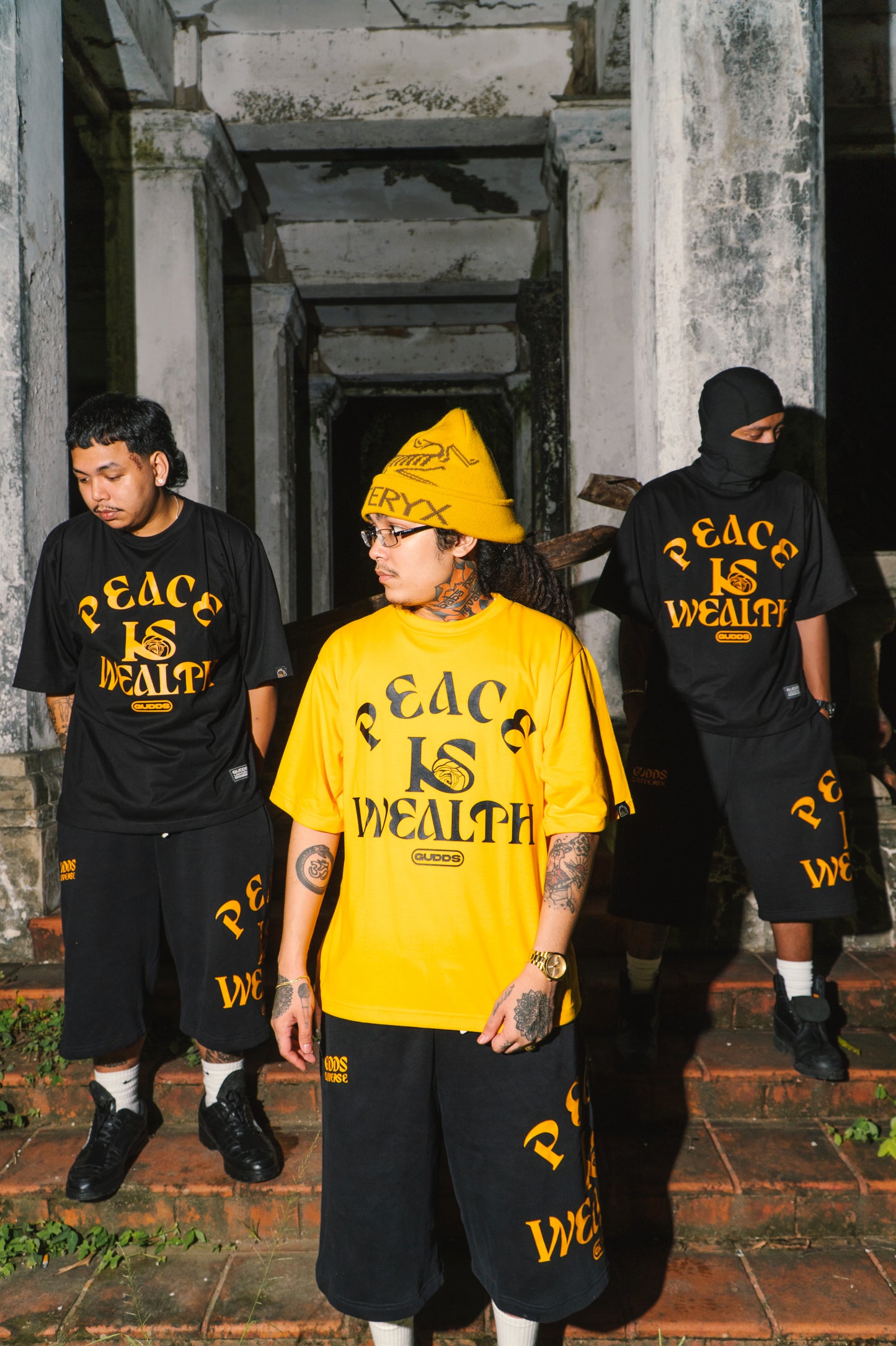 GUDDS UNIVERSE - “PEACE IS WEALTH” GRAPHIC TEE