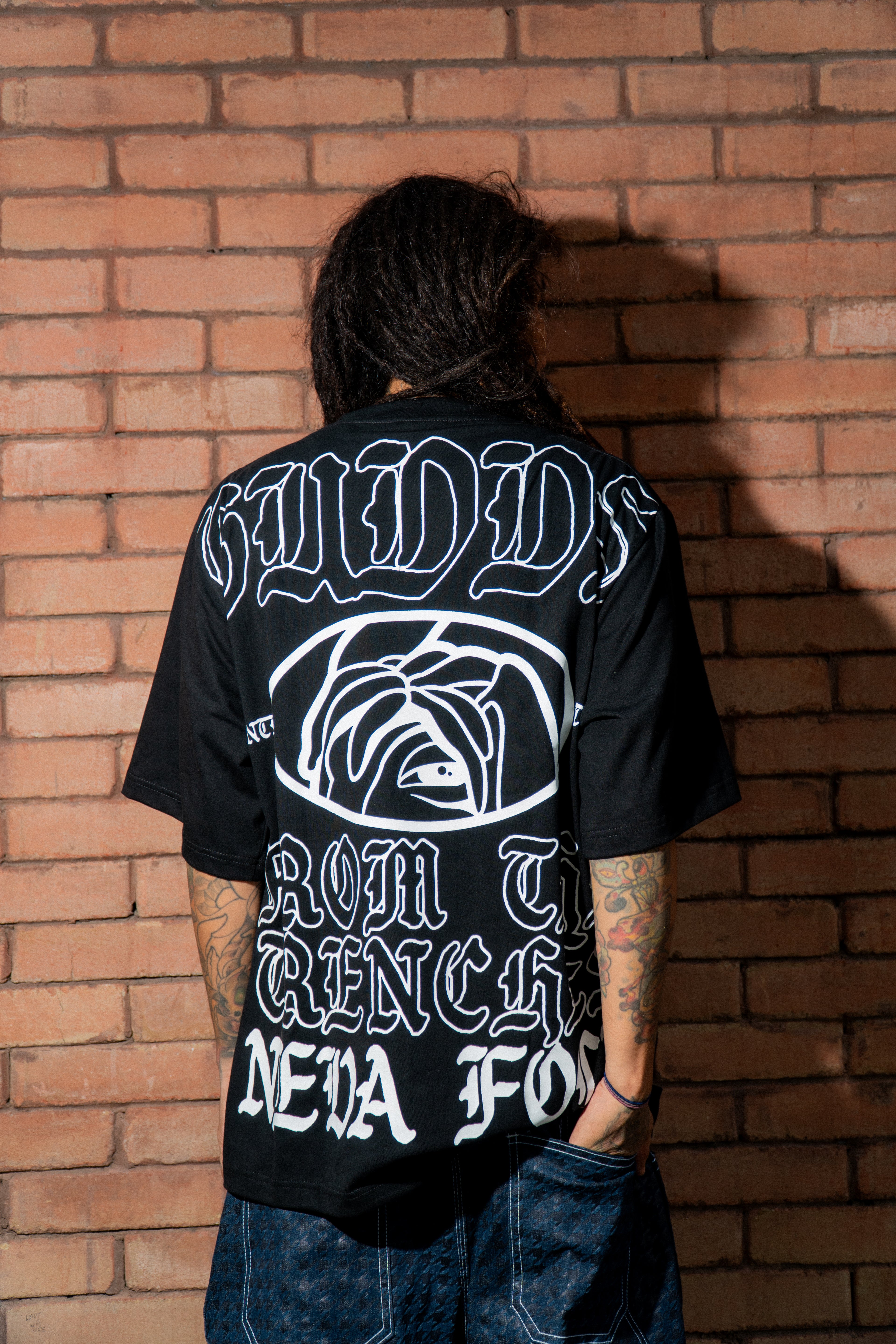 GUDDS UNIVERSE - "NEVA FOLD" BIG BACK PRINT TEE!