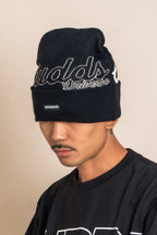 “CURSIVE” BEANIE WITH OVAL LOGO RUBBER PATCH